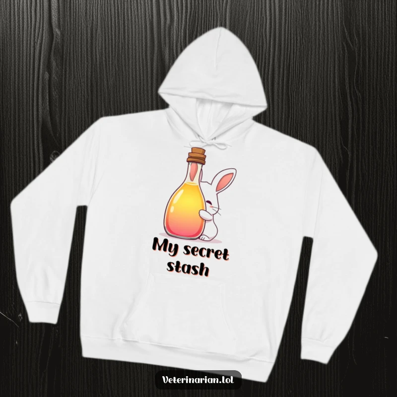 Funny hoodie with a shy rabbit peeking from a large bottle of colorful liquid, offering cozy comfort and a whimsical, mysterious vibe.
